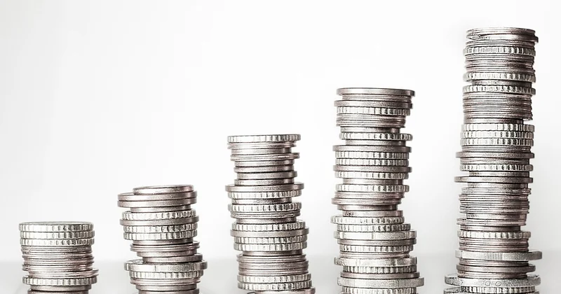 How does DeFi make money?